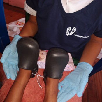 Human Rights Month Visit to Bokmakierie Primary School. Grade 7 Learners washing feet of children.